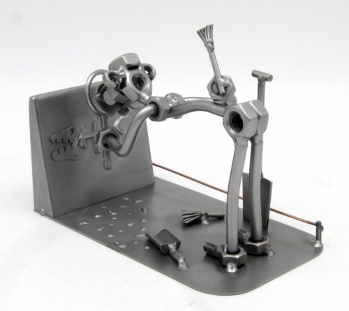 FIGURKA Z METALU - ARCHEOLOG